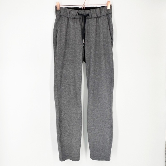 Lululemon On The Fly Pant 28" Heathered Black 4 - Picture 1 of 8